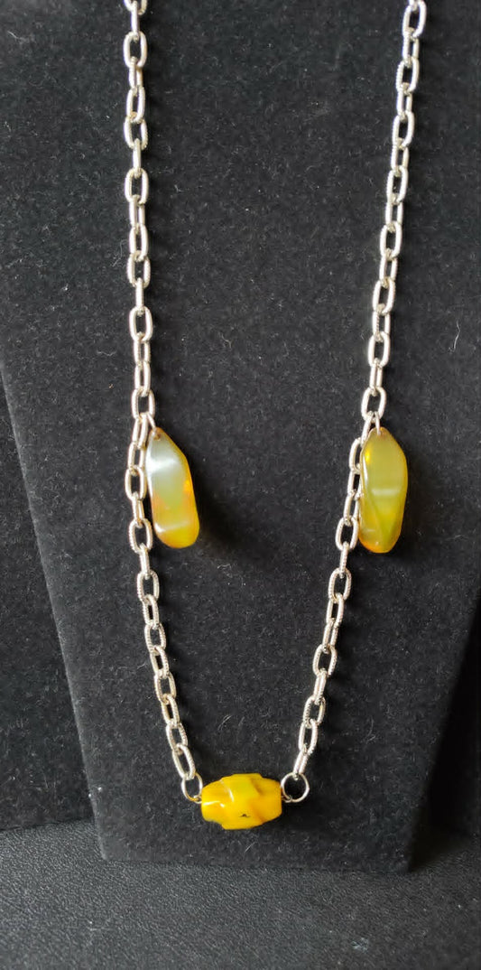 Vintage 26" apple juice Bakelite necklace, art deco carved barrel on a silver-toned chain, tested