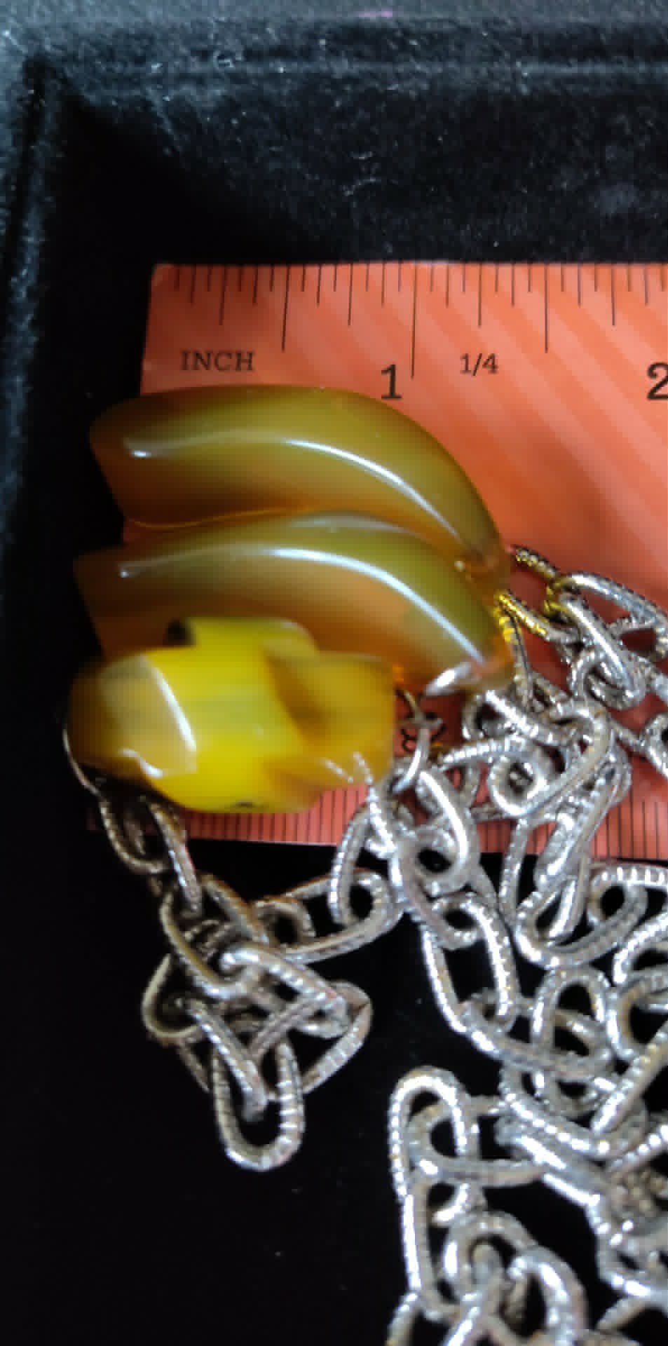 Vintage 26" apple juice Bakelite necklace, art deco carved barrel on a silver-toned chain, tested