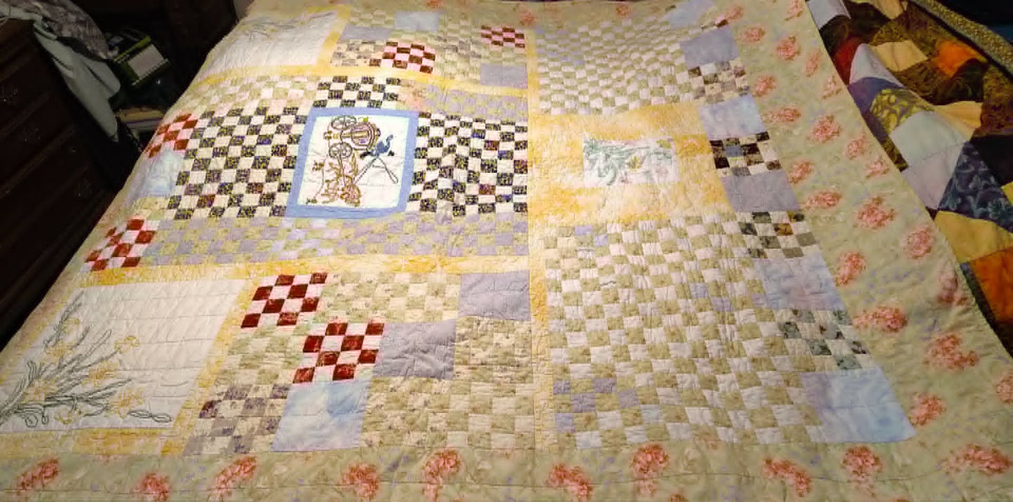 Vintage homemade checkerboard pastel 70x70 quilt, embroidered squares