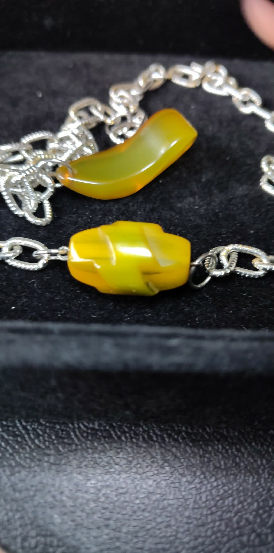 Vintage 26" apple juice Bakelite necklace, art deco carved barrel on a silver-toned chain, tested