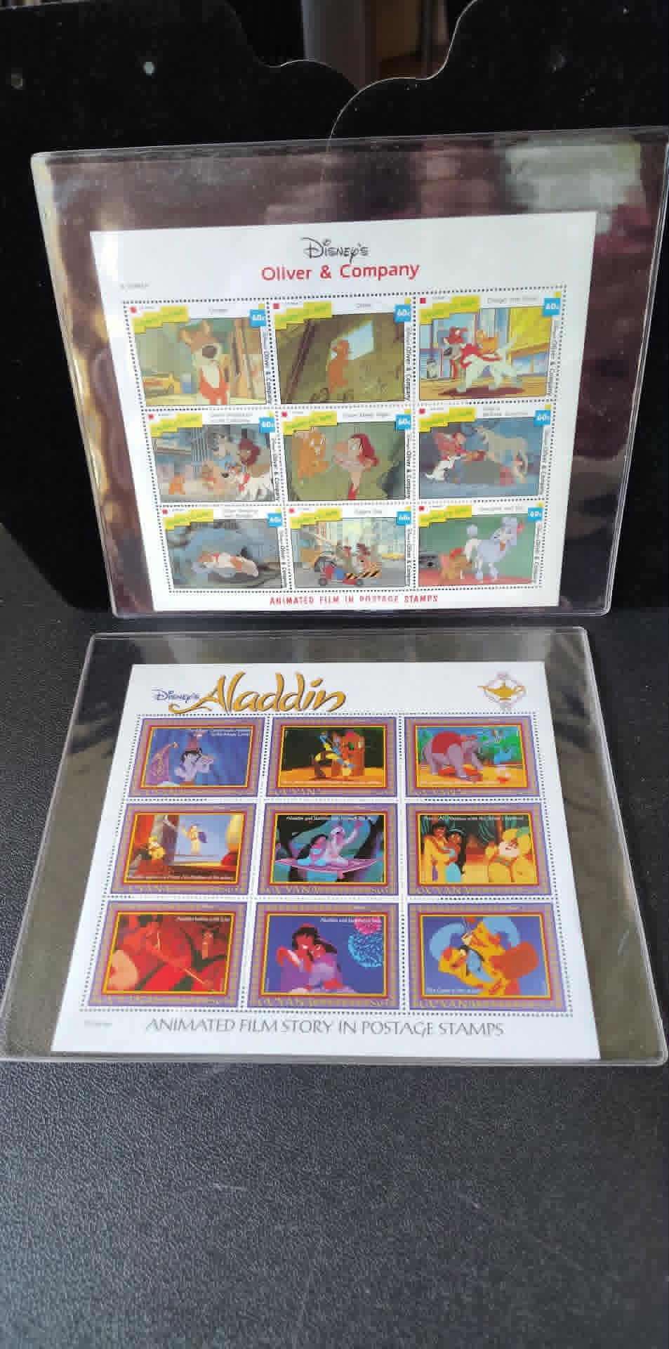 2 9pc stamp sheets MNH ICS Oliver & Company & Aladdin